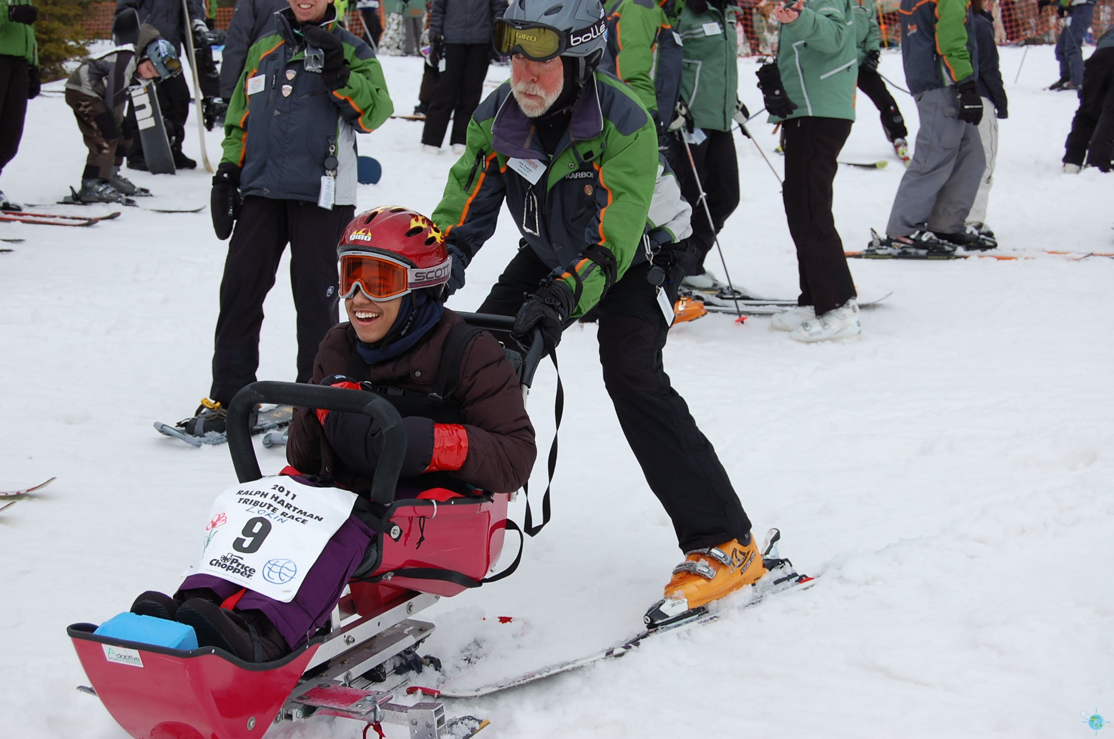 Man with disability and Winter Sports, handicapped persons and Mono Ski,  handicapped racer goes downhill on mono ski Stock Photo